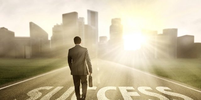 Manager walking on the road to success